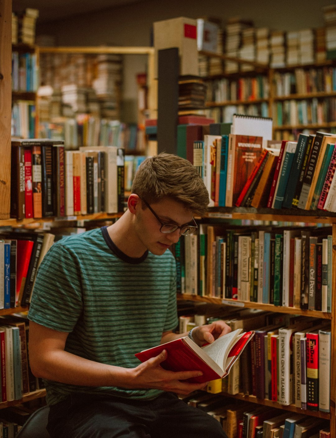 person reading book quietly